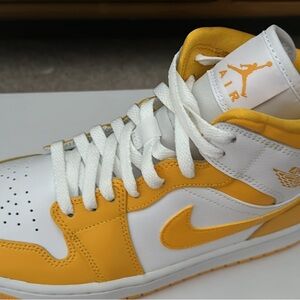 Like new and never used women’s Air Jordan 1 mid size 9.5